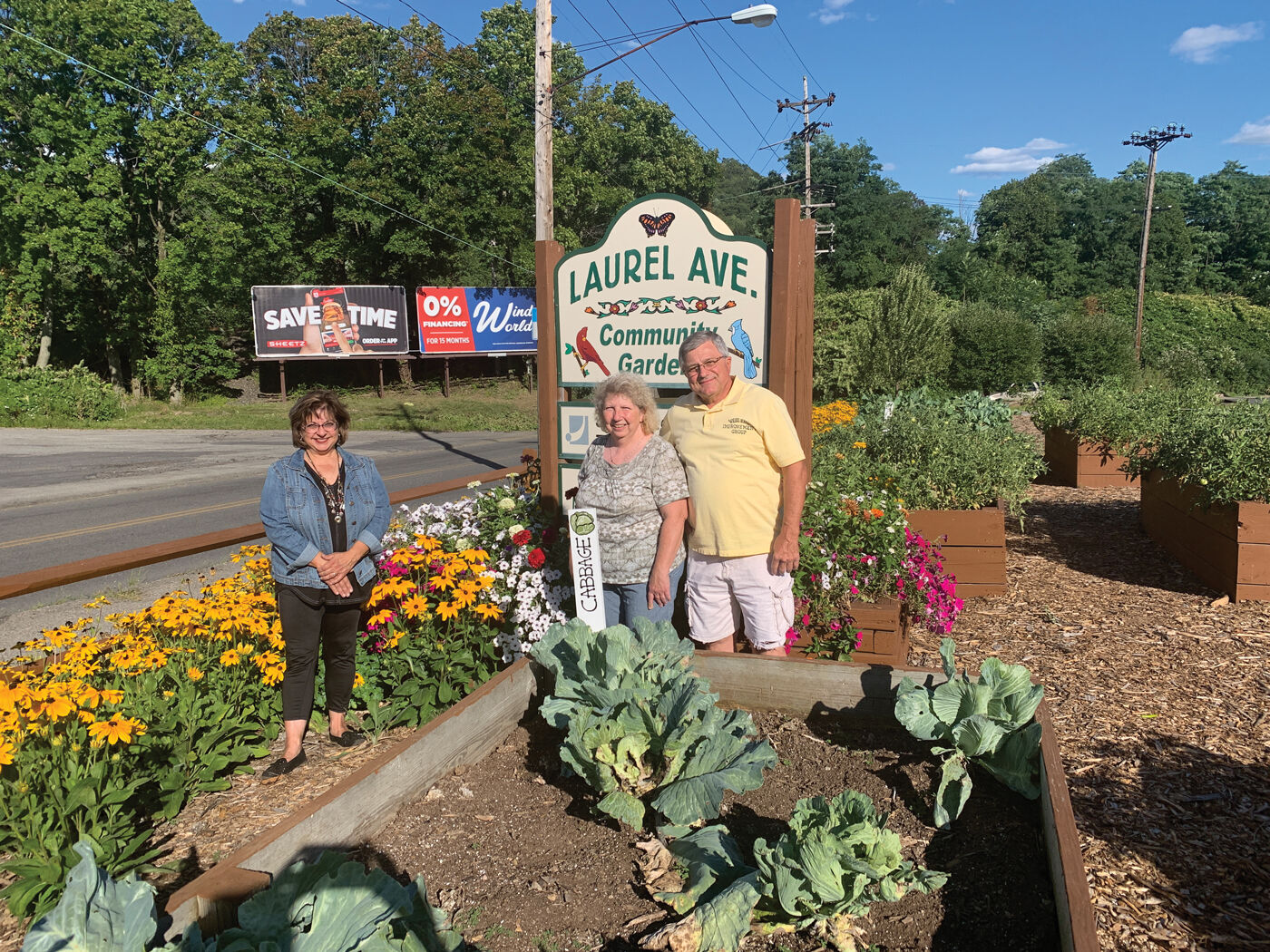 Marie-Mock-with-Rose-and-John-at-West-End-community-garden.jpg